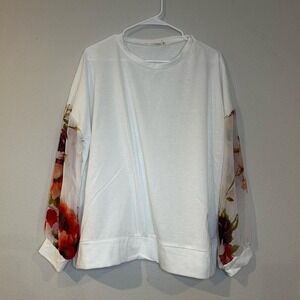 Long sleeve white sweatshirt with sheer floral sleeves in a women's size 1X.